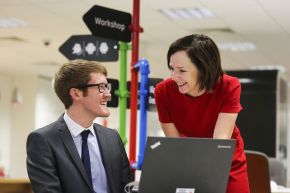 Ulster University graduate Mark Hutchinson has secured a graduate training position with PwC after taking part in a successful placement year. He is pictured with Director in Assurance at PwC, Orla MacAllister.
