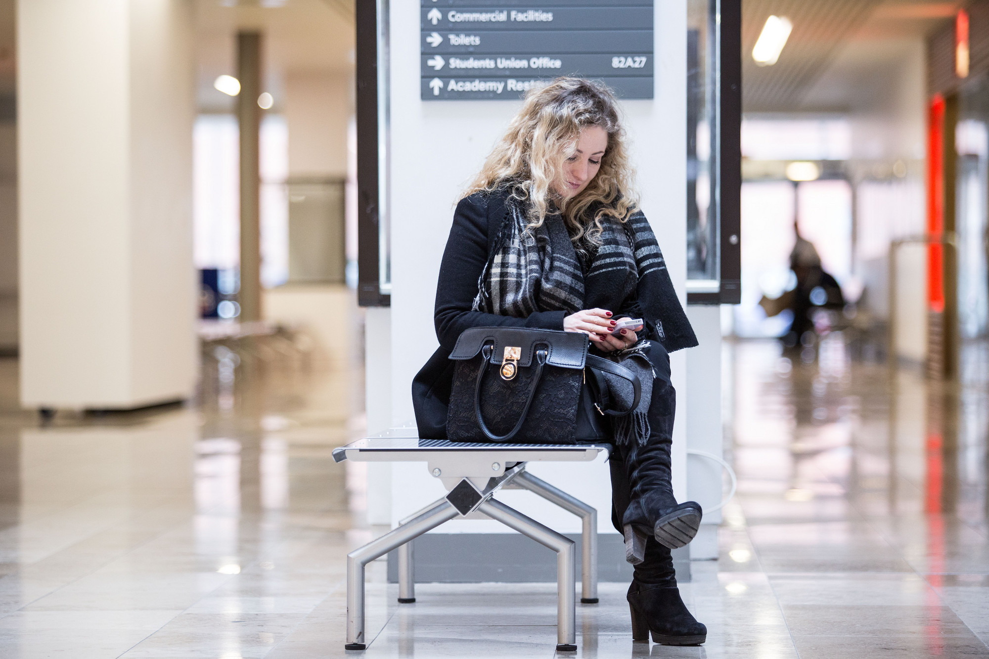 Girl in Belfast campus foyer