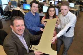 Nick Gray, Division Director at Liberty IT, winners of the over 50 employees category at last years awards, with Ulster University placement students, Ronan Burke, Orla Mooney and John Cronin-McCartney.