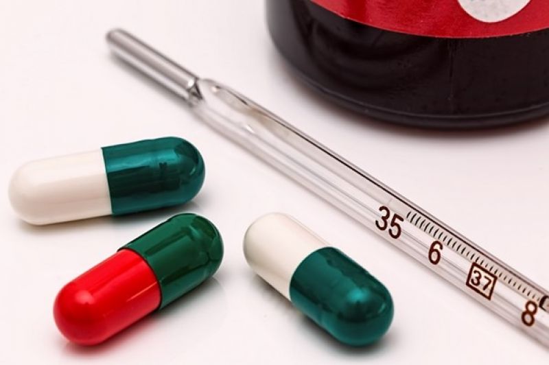 pills and thermometer