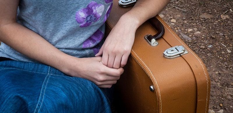 child with a suitcase