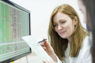 Researcher at computer