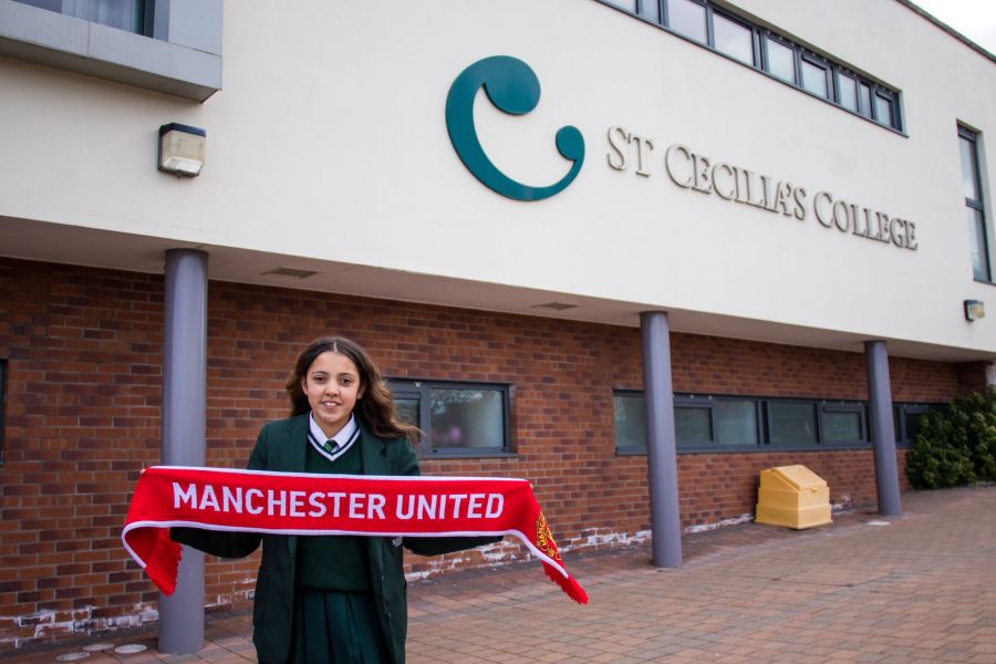 Manchester United’s Luke Shaw congratulates the winner of the Ulster University and Manchester United Foundation partnership competition  image