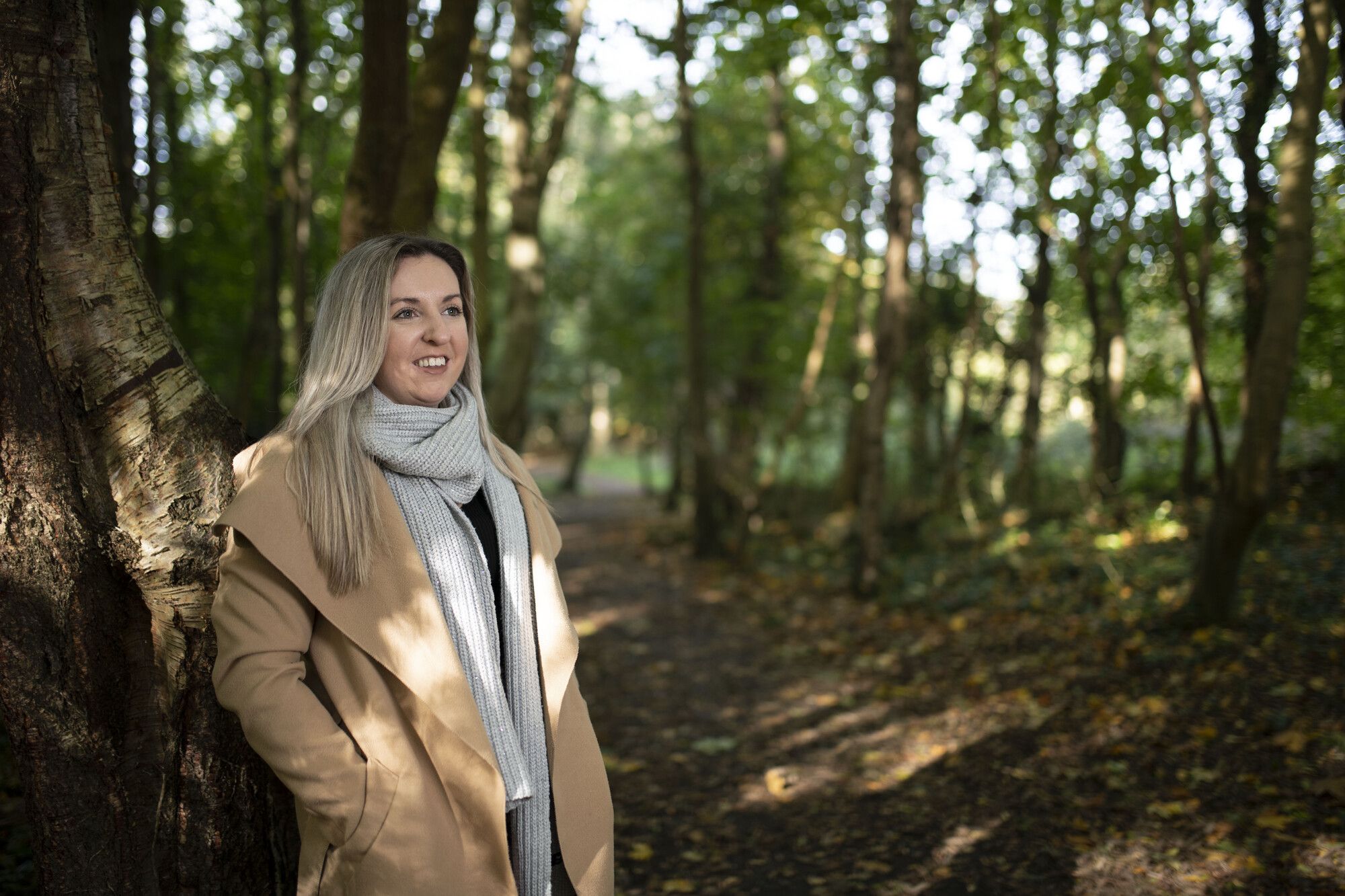 Student standing on Coleraine trail
