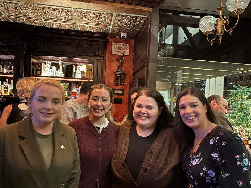 four females in a bar