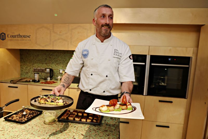 Image of Titanic Chef Museum Gareth Wilson showcasing the food demo he created during the IMD Event 2025