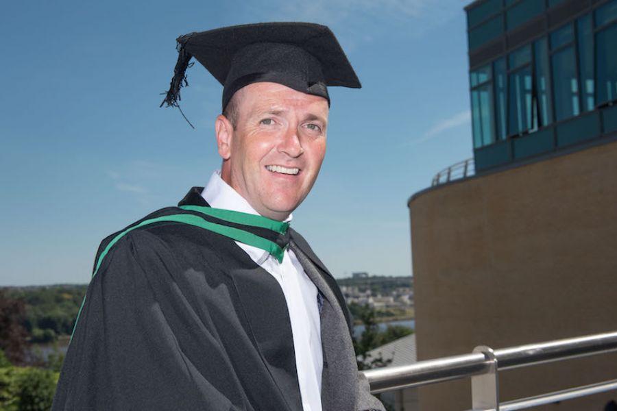 Determined father of five graduates after family business he headed went bust image