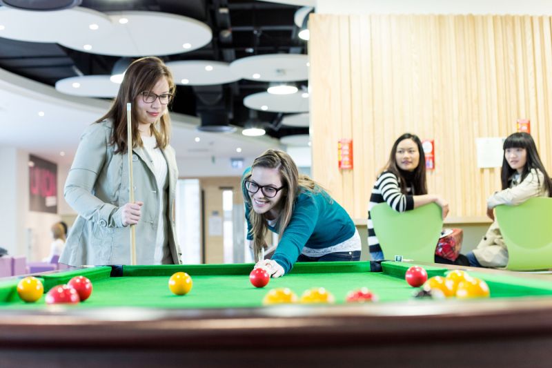 Women playing pool