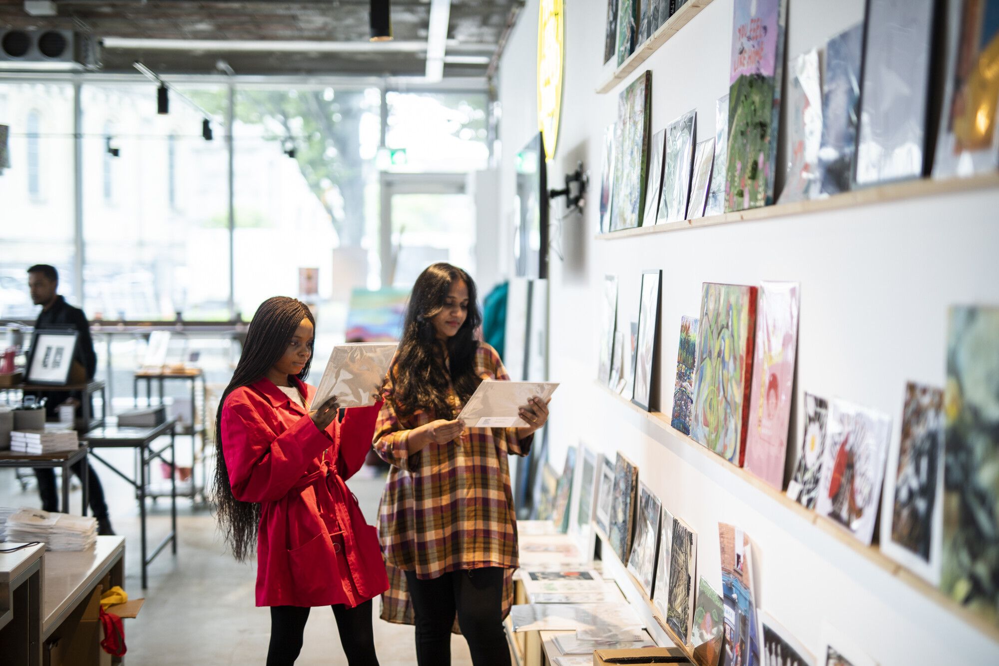 Two students in an art shop