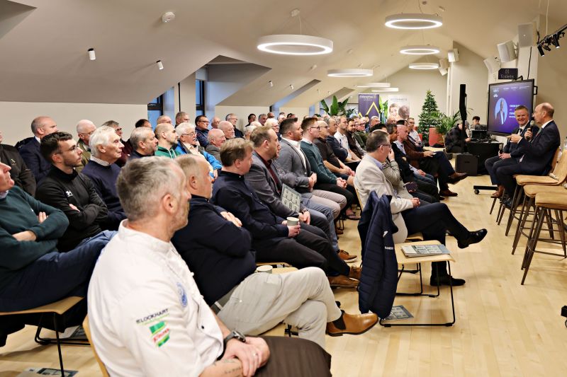 BBC Presenter Stephen Watson speaking to a room full of men during IMD event 2025