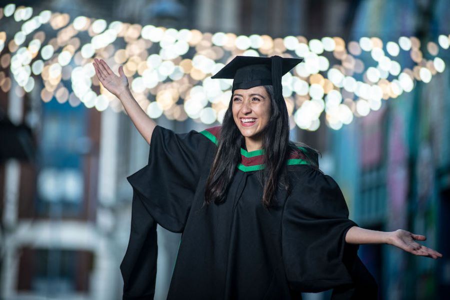 Inspirational international student graduates with distinction  image
